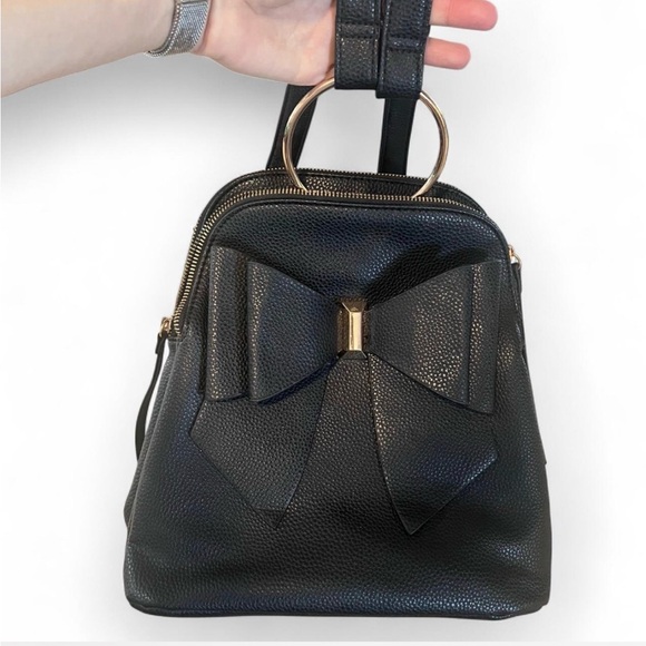 Crossi Handbags - Crossi Bow Backpack With Gold Detail